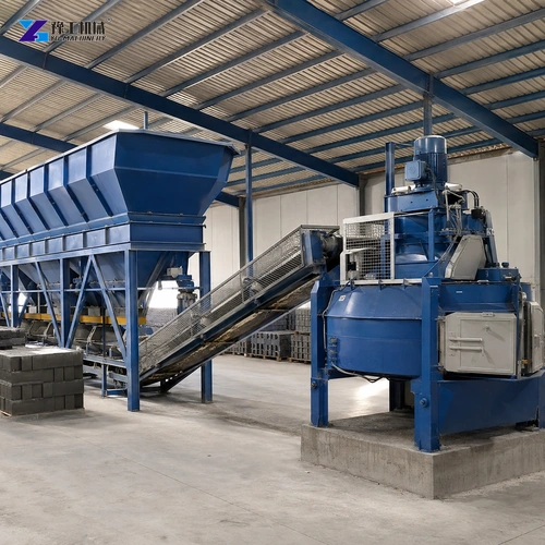 Blue Aggregate Bins Connected By A Guarded Inclined Conveyor To A Mixer