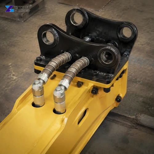 Protected Hydraulic Hoses And Capped Couplings On A Yellow Breaker Body