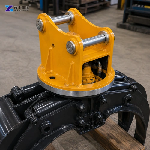 Two Steel Mounting Pins Spanning A Yellow Grapple Bracket