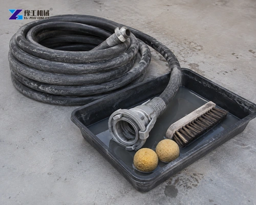 Disconnected Mortar Hose Coupling In A Wash Tray With Brush And Sponge Balls