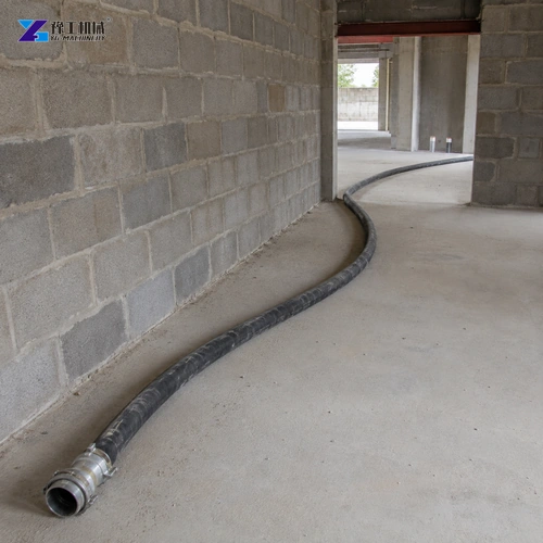 Reinforced Mortar Hose Curving Along A Masonry Wall Through A Doorway