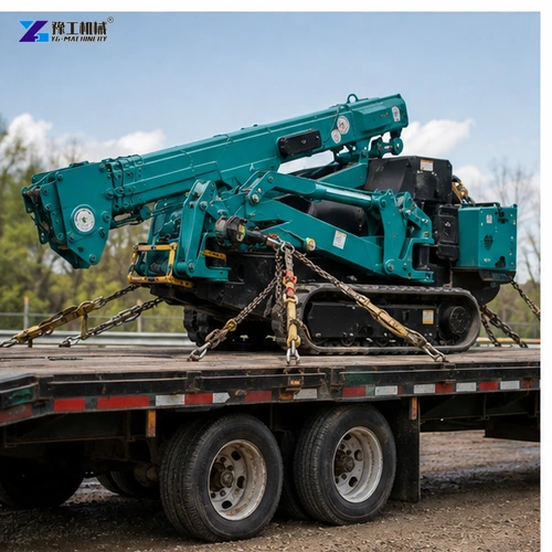 Teal spider crane positioning glass panel at facade
