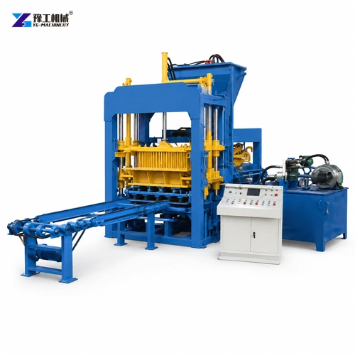 Blue And Yellow Concrete Block Machine With Control Cabinet And Output Conveyor