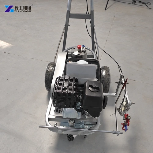 Airless road marking machine pump controls and engine from above