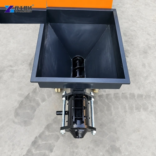 Cement spray machine hopper and screw pump viewed from above