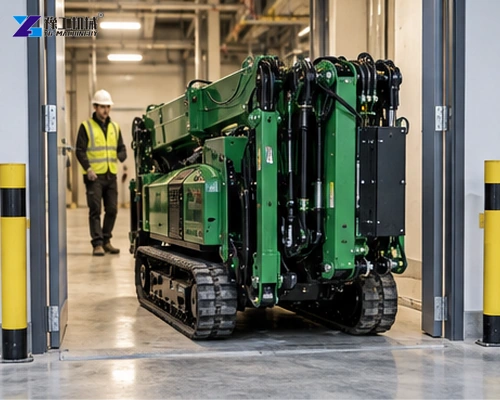 Compact spider crane working inside an industrial building