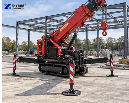 Tracked spider crane deployed on outriggers at a prepared steel-frame worksite