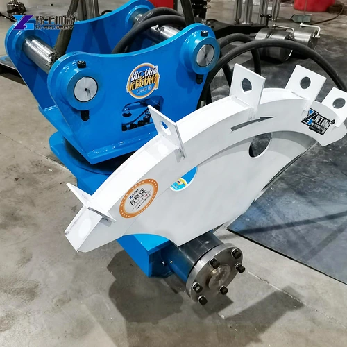 Hydraulic rock saw attachment with a curved blade cover
