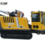 Tracked horizontal directional drill with powerhead, cab and crawler base