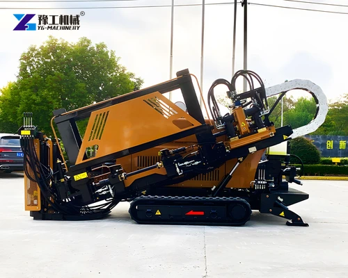 Horizontal directional drill with exposed hydraulic components and crawler tracks