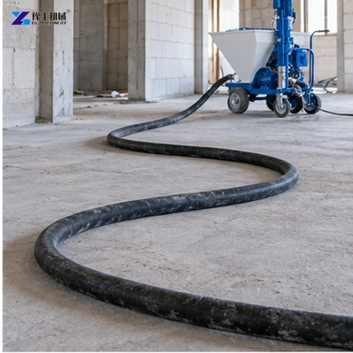 Mortar delivery hose laid across a concrete floor