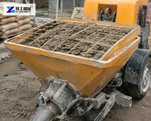 Mortar pump hopper with safety grate installed