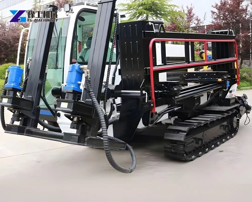 HDD powerhead assembly and rod carriage mounted on a tracked drilling rig