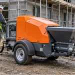 Render Spraying Machine Selection For Consistent Wall Finish Render spraying machine prepared beside a wall finishing area