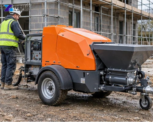 Render spraying machine prepared beside a wall finishing area