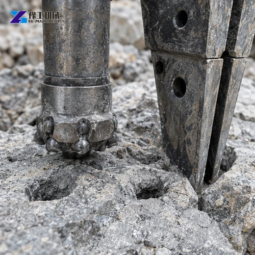 Rock drill bit contacting fractured stone
