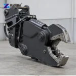 Excavator Shear for Car Dismantling: Match the Work Complete excavator shear attachment displayed against a factory floor