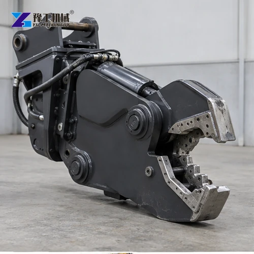 Complete excavator shear attachment displayed against a factory floor