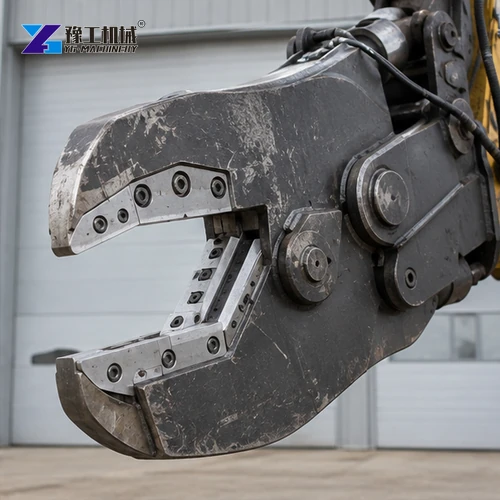 Opposite-angle detail of excavator shear jaw pivot and cutting edge