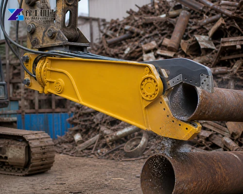Eagle Beak shear positioned around a steel pipe for a planned cut