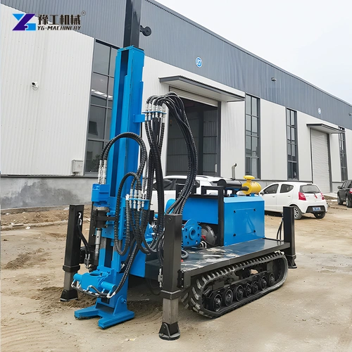 Blue Hydraulic Core Rig With Raised Mast Outside A Factory