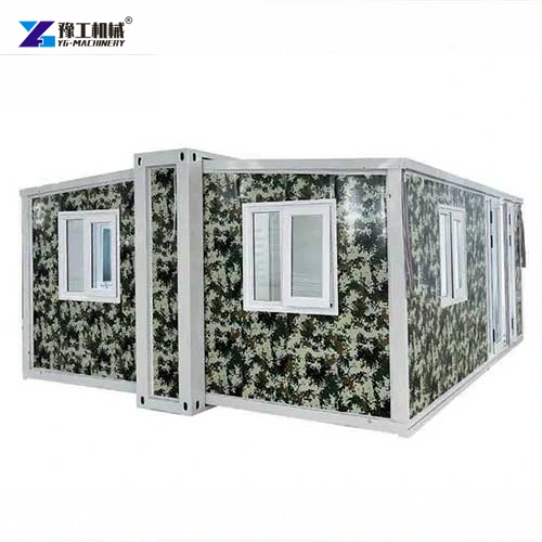Expandable panel house with camouflage wall finish and white window frames