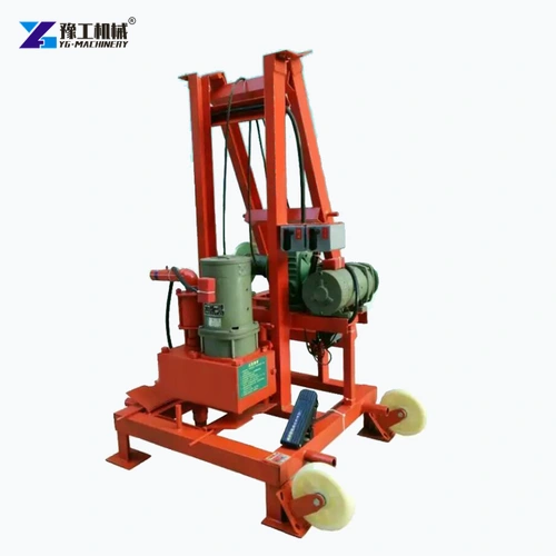 Compact red electric drilling frame with its motor and wheel assembly visible