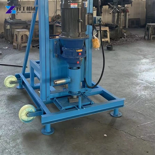 Drive and lower guide components on a blue electric well-drilling frame