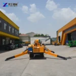 Mini Crawler Spider Crane Mini crawler spider crane front view in a yard