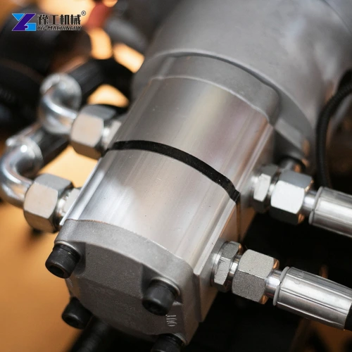 Compact loader hydraulic assembly