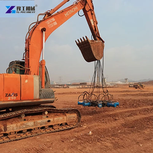 Excavator carrying a blue pile breaker above an open earthwork site