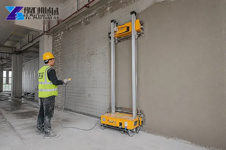 YG automatic wall plastering machine applying mortar along a wall on twin vertical guide rails